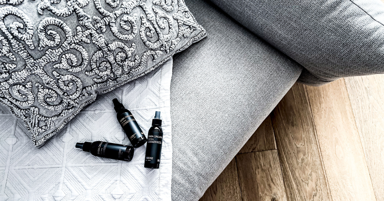 divine room sprays on bed linen 